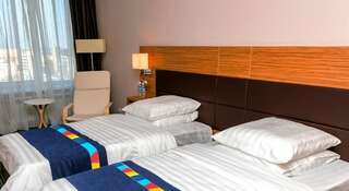 Гостиница Астория Владивосток Стандартный двухместный номер с 1 кроватью или 2 отдельными кроватями-1